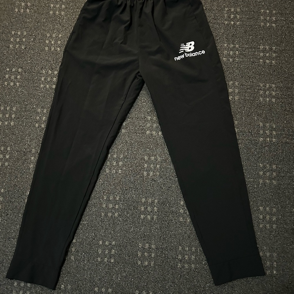 New Balance slim fit athletic pants, never worn.